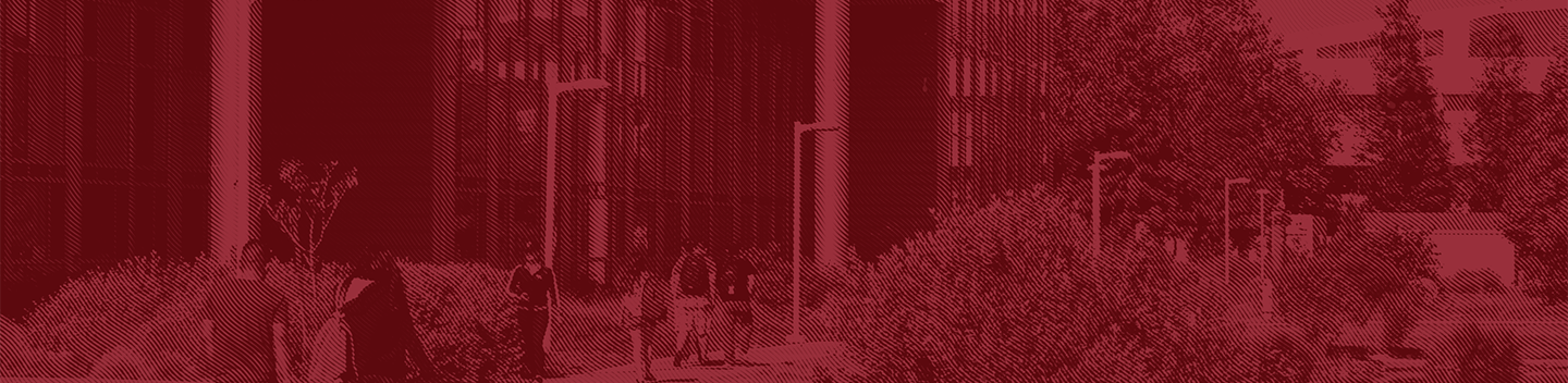 A red-tinted image of a modern campus with students walking on a pathway. Tall buildings and trees border the path, creating an academic atmosphere.