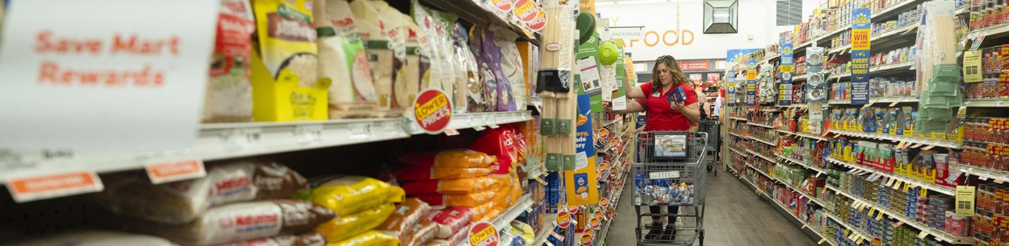 Basic Needs staff in Save Mart's aisle