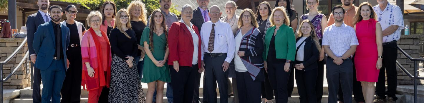 Group photo of the 2025 Rogers Scholars outdoors in front of the Faculty Development Center