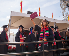 graduate at commencement ceremony