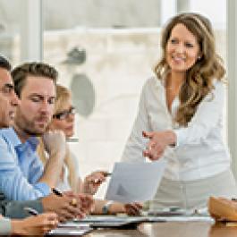 Woman giving meeting presentation