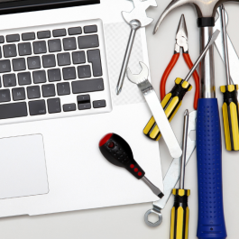 tools next to laptop