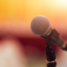 A close up of a stage microphone. 