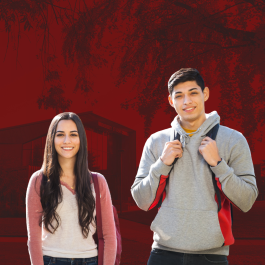 Two students posed in front of the Student Center.