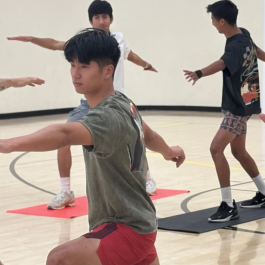 Students practicing yoga.