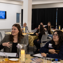Students gathered at tables for the Dr. Marvalene Hughes Conference.