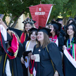 A group of graduates from the Masters of Psychology program at the Class of 2026 ceremonies