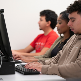 Students are seen at a computer lab at Stan State's Library
