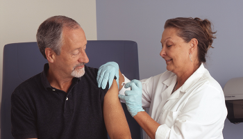 nurse administering shot