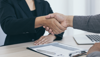 Two people shaking hands