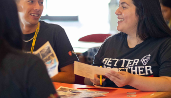 Photo of students interacting.