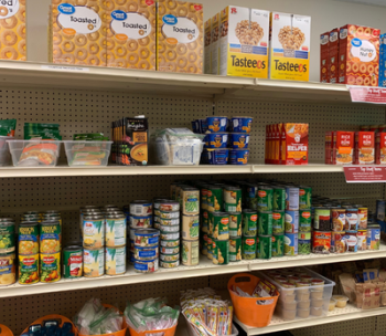 Shelves of food at Warrior Food Pantry.