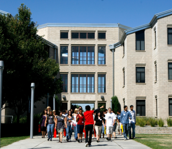 Students walking out of Demergrasso Bava Hall