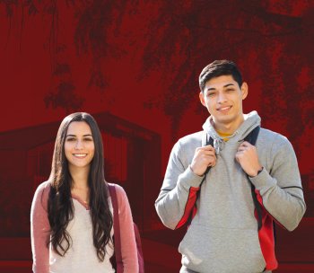 Two students posed in front of the Student Center.