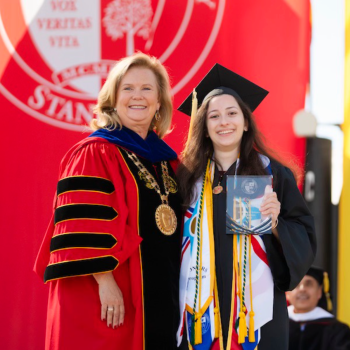 commencement president with awarded grad
