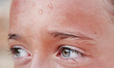 Woman sweating.