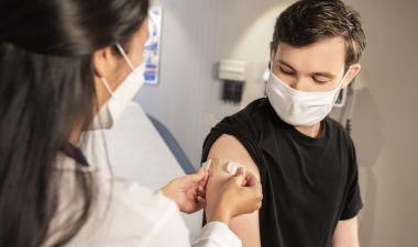 Student receiving a vaccine.