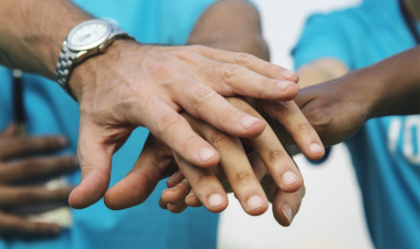 male hands in a support group