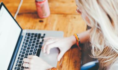 Student taking online notes.