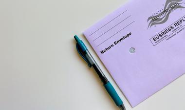 American election mail envelope with pen.