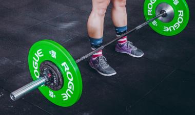 Person getting ready to do deadlift