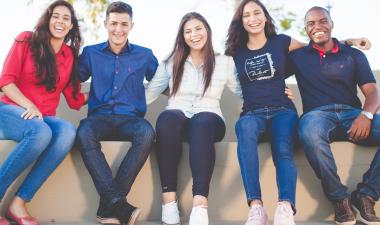 A group of college students taking a picture.