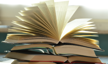books stacked on top of each other
