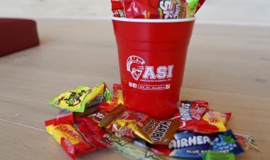 ASI cup with candy overflowing
