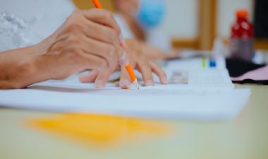 Hand writing with a pencil