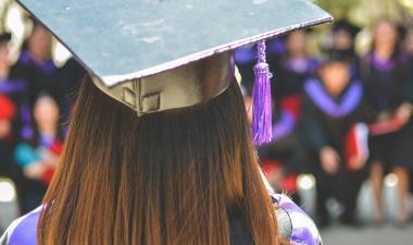 Person with a graduation cap on
