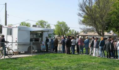 People Lining Up for the USF Truck