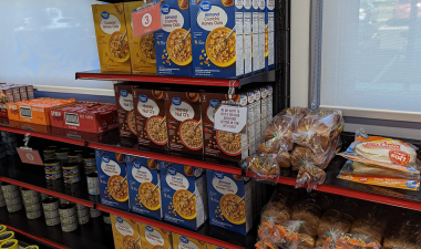 Shelves with boxes at the Warrior Food Pantry in Stockton