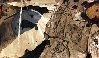 Materials like cardboard, paper, and rope bunched up