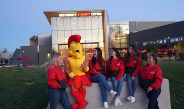 group of students with university mascot
