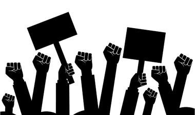 Fists raised, some holding signs