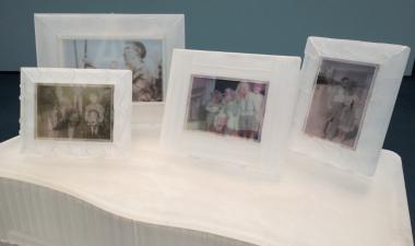 Operating Under the Influence Exhibition: Picture frames on a table