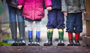 Children standing in the mud