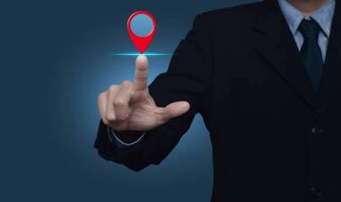 Location pin on a hand