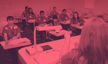 Nursing students seated in a classroom during a lecture.