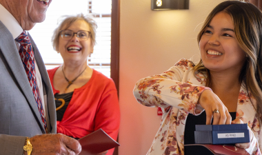 John Rogers and a scholarship recipient