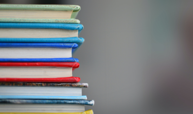 books stacked on top of each other.