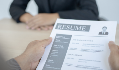 a person reading a resume during an interview