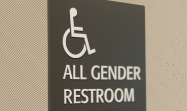 Signage for a wheelchair accessible all-gender restroom