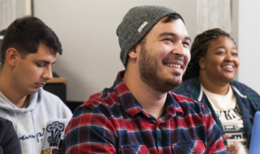 Students seated inside a classroom during instruction.