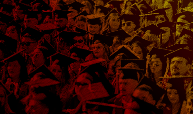 Duotone graphic of graduating students in caps and gowns at Commencement.
