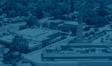 Duotone image of an aerial shot of a Central Valley city.