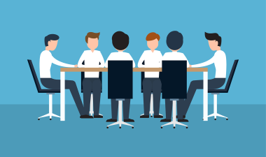 cartoon figures sitting around a conference table