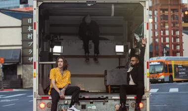Nevin Shocker, alumnus, in a truck for a music video