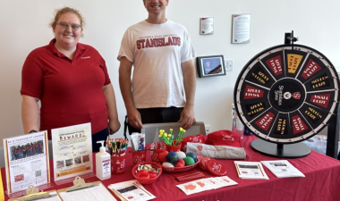 an image STEM ambassadors manning an information booth
