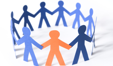 human figures holding hands in a circle